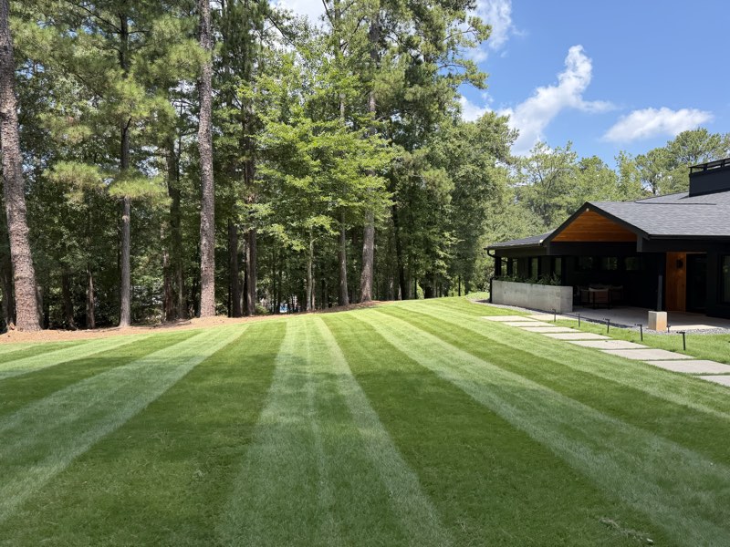 Wide striped lawn freshly mowed at a modern home near Athens, GA